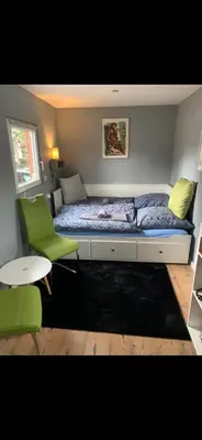 Ein Bett oder Betten in einem Zimmer der Unterkunft Tiny-Ferienwohnung Hellerau 2