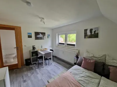 Ein Bett oder Betten in einem Zimmer der Unterkunft Tinyroom mit Ausblick
