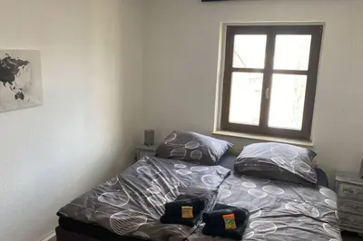 Ein Bett oder Betten in einem Zimmer der Unterkunft Wunderschöne großzügige Neustadtwohnung
