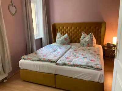 Ein Bett oder Betten in einem Zimmer der Unterkunft Apartment Weinblick Radebeul, Dresden