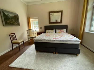 Ein Bett oder Betten in einem Zimmer der Unterkunft Luxuriöse FeWohnung Felsenblick