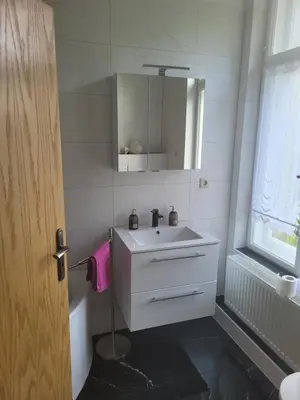 Ein Badezimmer in der Unterkunft Ferienwohnung Rote-Villa 2