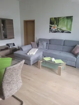 Ein Sitzbereich in der Unterkunft Ferienwohnung Rote-Villa 2