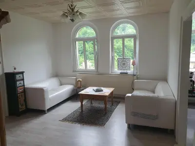 Ein Sitzbereich in der Unterkunft Ferienwohnung Kirchblick