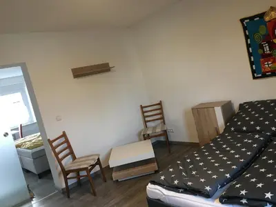 Ein Bett oder Betten in einem Zimmer der Unterkunft Apartment im Stadthaus