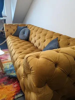 Ein Sitzbereich in der Unterkunft Ferienwohnung Am Stadtpark