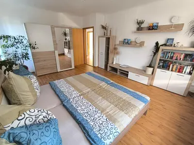 Ein Bett oder Betten in einem Zimmer der Unterkunft Ferienwohnung 