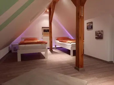 Ein Bett oder Betten in einem Zimmer der Unterkunft FeWo Zum Malerweg Pirna