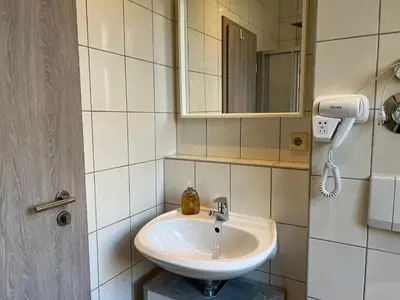 Ein Badezimmer in der Unterkunft Pension Kaditz