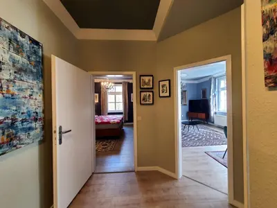 Ein Bett oder Betten in einem Zimmer der Unterkunft ArtHouse Am Kurpark Bad Schandau