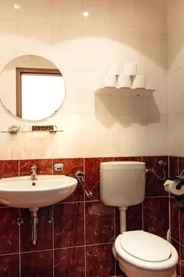 Ein Badezimmer in der Unterkunft Hotel und Restaurant Golden Village