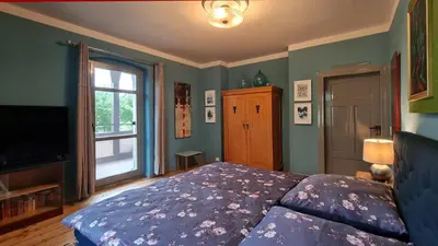 Ein Bett oder Betten in einem Zimmer der Unterkunft ArtHouse Lilienstein