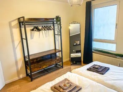 Ein Bett oder Betten in einem Zimmer der Unterkunft Stilvolles 60qm City Apartment Zentrumsnahe 2R