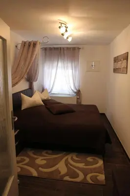 Ein Bett oder Betten in einem Zimmer der Unterkunft Ferienwohnung 