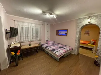 Ein Bett oder Betten in einem Zimmer der Unterkunft Ferienwohnung ILSENHOF
