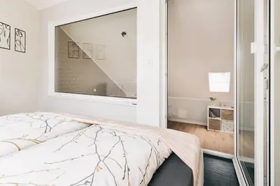 Ein Bett oder Betten in einem Zimmer der Unterkunft TIP! Toplage in Dresden! Moderne 100 qm Ferienwohnung für Familien und kleine Gruppen