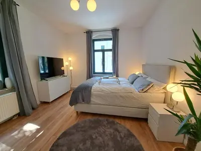 Ein Bett oder Betten in einem Zimmer der Unterkunft Gemütliche helle Ferienwohnung