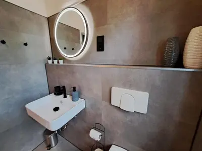 Ein Badezimmer in der Unterkunft Gemütliche helle Ferienwohnung