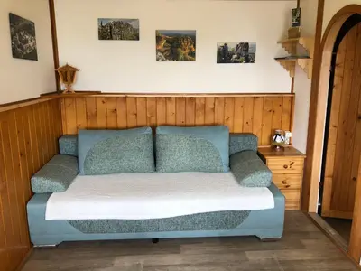 Ein Sitzbereich in der Unterkunft Gartenlandhaus