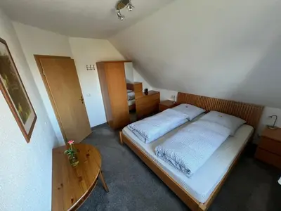 Ein Bett oder Betten in einem Zimmer der Unterkunft Ferienwohnung Dresden