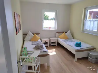 Ein Bett oder Betten in einem Zimmer der Unterkunft Ferienapartment 21