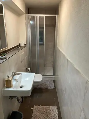 Ein Badezimmer in der Unterkunft Pension Alpenrose