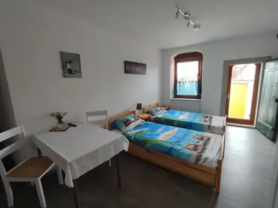 Ein Bett oder Betten in einem Zimmer der Unterkunft Gästewohnung Fischer