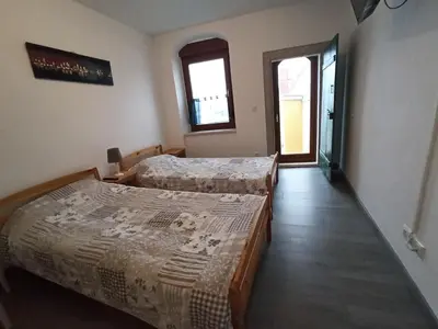 Ein Bett oder Betten in einem Zimmer der Unterkunft Gästewohnung Fischer