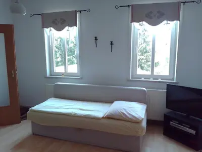 Ein Sitzbereich in der Unterkunft Ferienwohnung Zuschke
