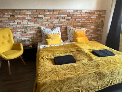 Ein Bett oder Betten in einem Zimmer der Unterkunft ANGEBOT - modern & gemütlich mit Parkplatz, Balkon, WiFi, Waschmaschine - 5min zum Schloss