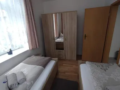 Ein Bett oder Betten in einem Zimmer der Unterkunft Ferienwohnung Lange