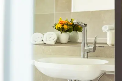 Ein Badezimmer in der Unterkunft Hotel am Schwanenhaus