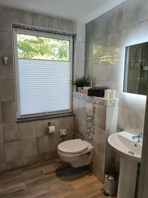 Ein Badezimmer in der Unterkunft Pension Mojito Senftenberg