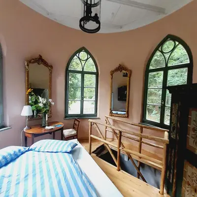Ein Bett oder Betten in einem Zimmer der Unterkunft Rapunzel trifft Dornröschen