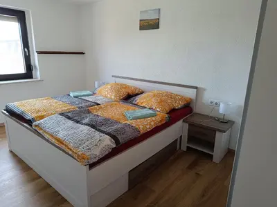 Ein Bett oder Betten in einem Zimmer der Unterkunft Dorfidyll