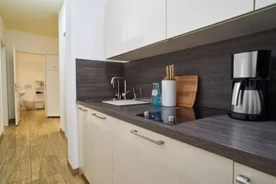 Küche/Küchenzeile in der Unterkunft Global Living - Design Apartments I City Center I Balcony I Smart-TV I Kitchen I Dresden