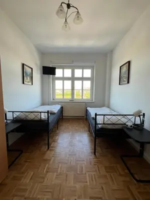 Ein Bett oder Betten in einem Zimmer der Unterkunft Sweet Home Inside Dresden Rooms