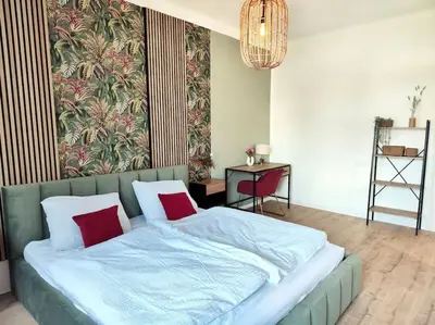 Ein Bett oder Betten in einem Zimmer der Unterkunft tealounge 2 Raum + Küche