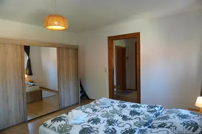 Ein Bett oder Betten in einem Zimmer der Unterkunft Ferienwohnung Ufer - Urlaub in der Sächsischen Schweiz