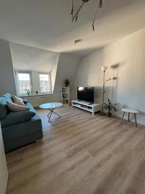 Ein Sitzbereich in der Unterkunft 1 Raum Dachgeschosswohnung in ruhiger Lage