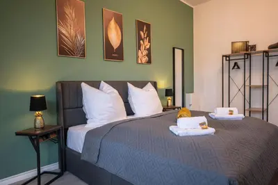 Ein Bett oder Betten in einem Zimmer der Unterkunft Loh9 - Das Apartment im Citycenter - Parkplatz - Wlan - Aufzug
