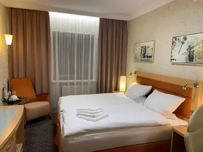 Ein Bett oder Betten in einem Zimmer der Unterkunft Alter Hof