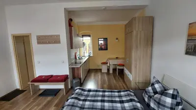 Ein Bett oder Betten in einem Zimmer der Unterkunft Kleine Apartments