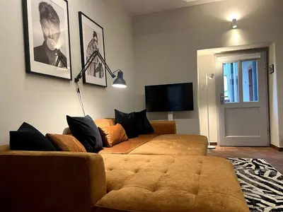Ein Sitzbereich in der Unterkunft Design Suite Altstadt am Markt mit Parkplatz