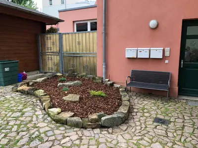 Ein Garten an der Unterkunft Ferienwohnung STENJA