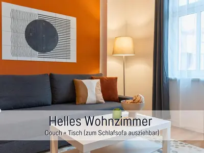 Ein Sitzbereich in der Unterkunft BENVILLE BV04 - Nespresso Kaffee - Zentral - WLAN - Küche & Spülmaschine - Waschmaschine