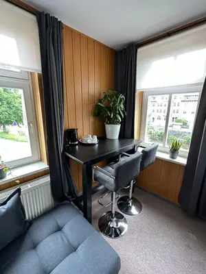 Ein Sitzbereich in der Unterkunft Pension Zur Wartburg