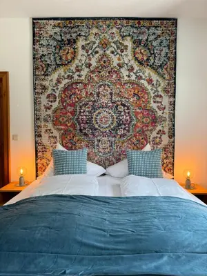 Ein Bett oder Betten in einem Zimmer der Unterkunft Kavaliershaus neben Schloss Rauenstein