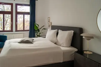 Ein Bett oder Betten in einem Zimmer der Unterkunft Große familienfreundliche Wohnung in Dresden