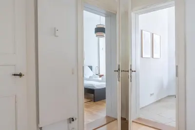 Ein Bett oder Betten in einem Zimmer der Unterkunft Schloss - Apartments an der Uni - Klinik